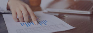 Annual Credit Review Process meeting with financial data sheet